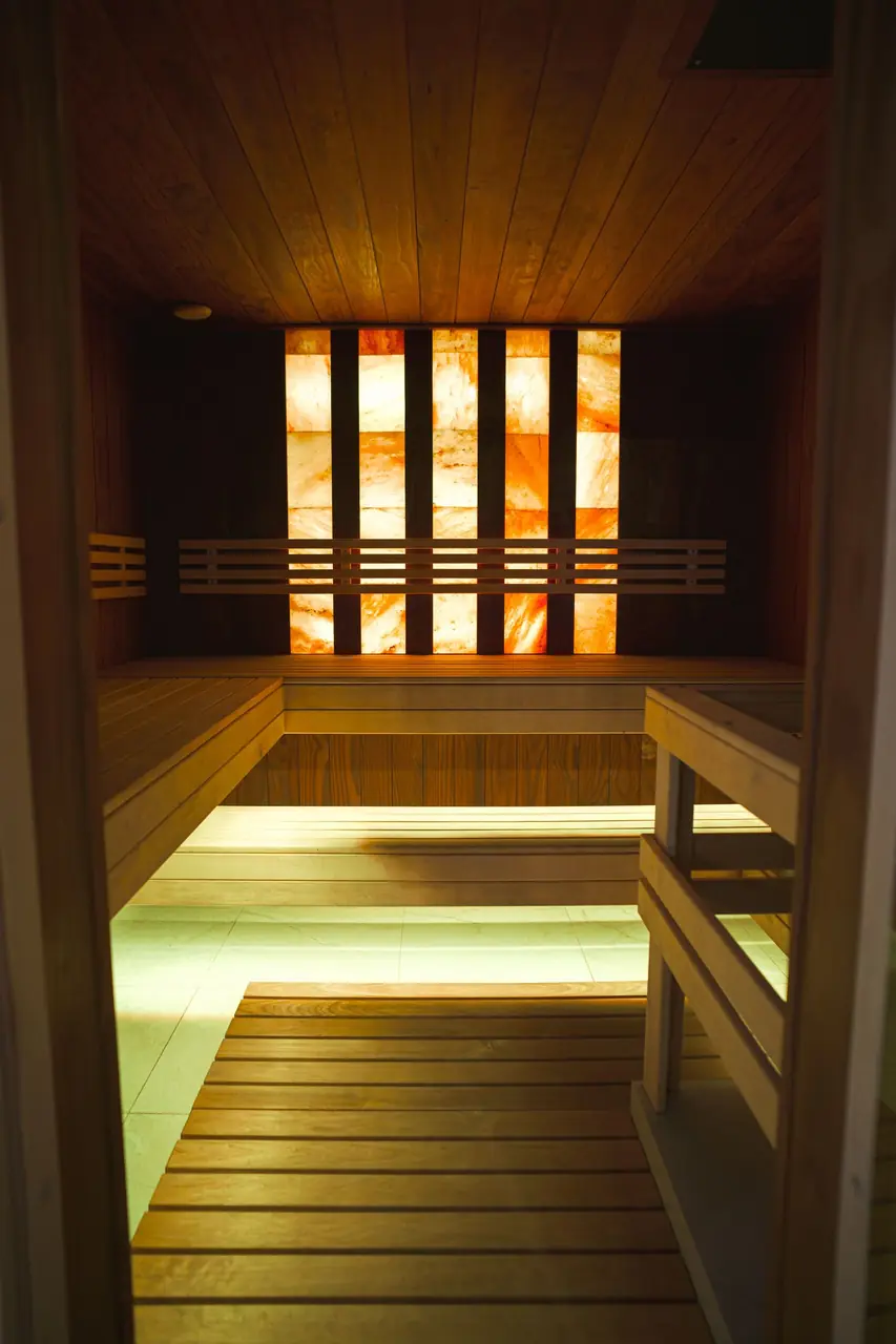 Cozy modern sauna with salt wall